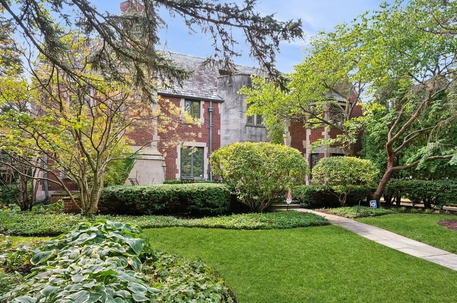 a view of a house with a garden