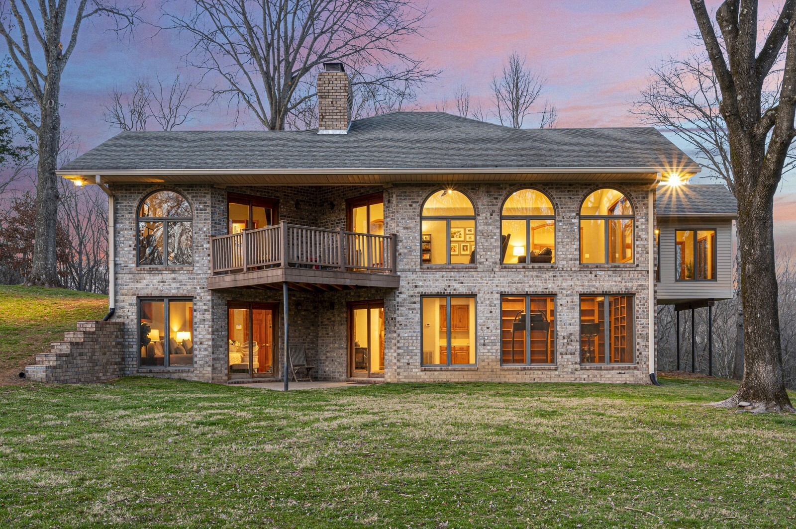 The Passive Solar design of this home features large south facing windows to utilize the sun's light in the winter and extended over hang cools provide shade during the warmer months.