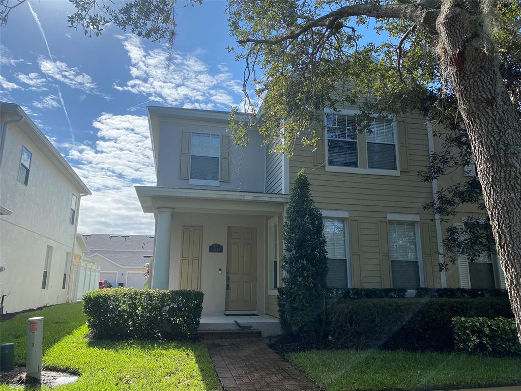 front view of a house with a yard