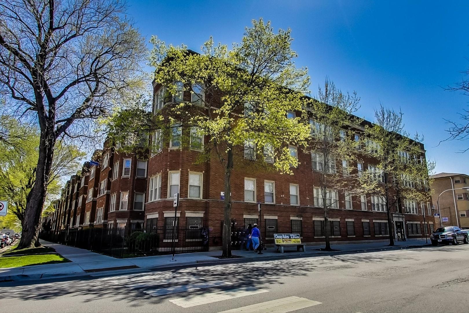 a front view of a building with street view