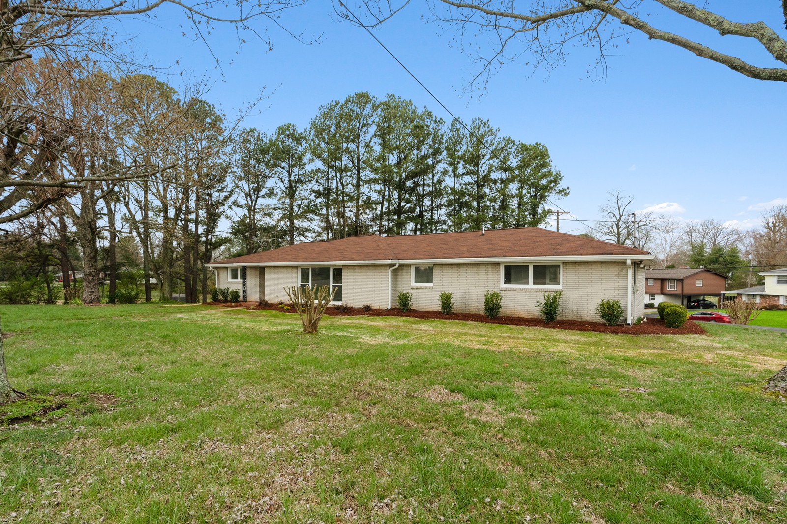 a view of a house with a big yard