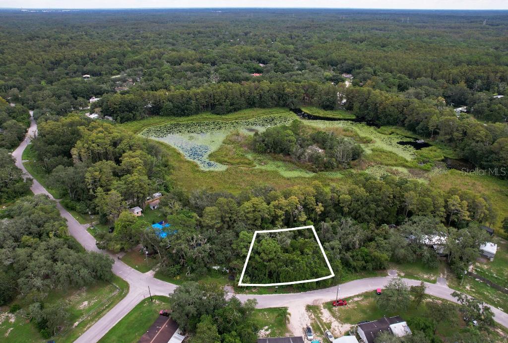 an aerial view of a backyard