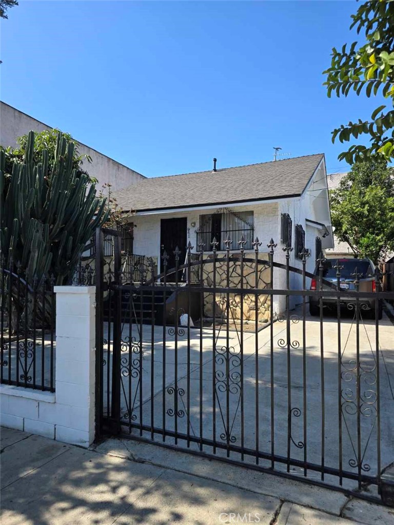 a front view of house yard with green space