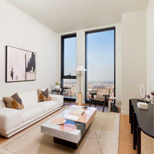 a living room with furniture and view of living room