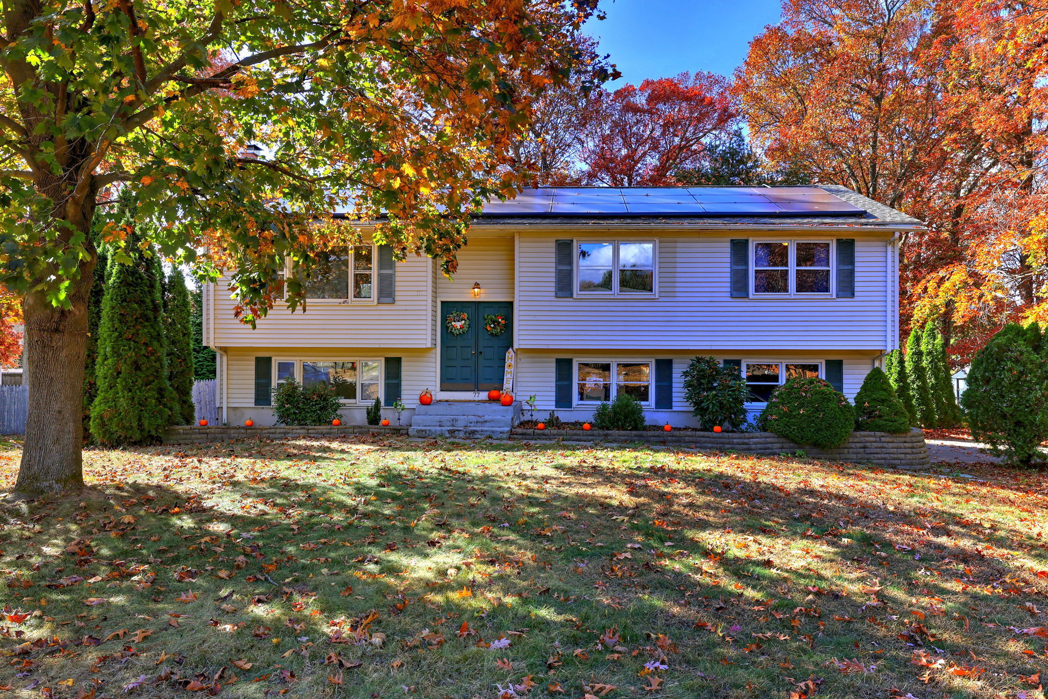 front view of a house with a yard