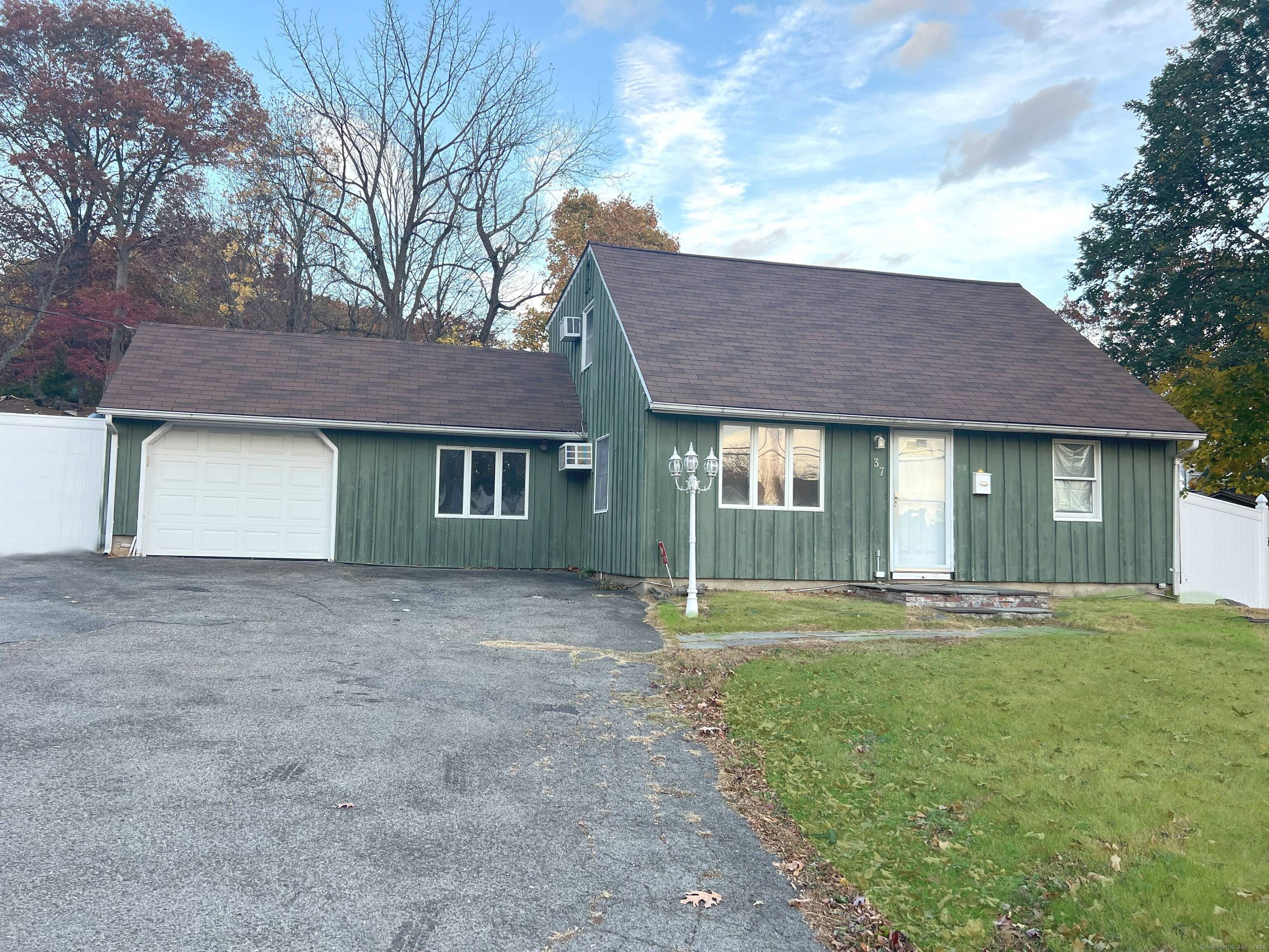 Front house and wide driveway