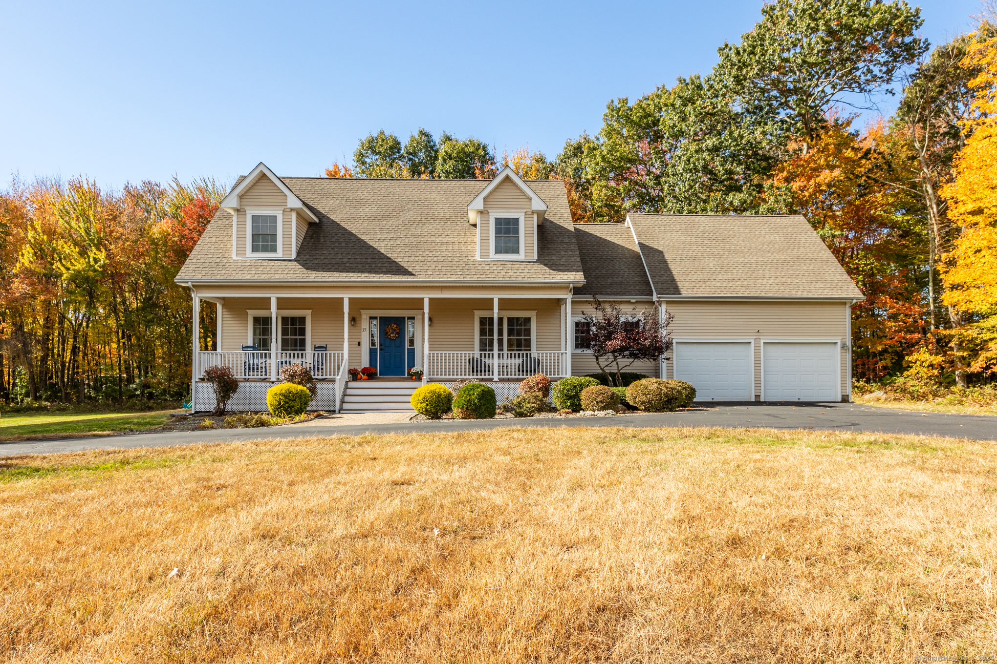 a house view with a outdoor space and sitting space