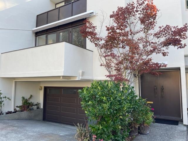 front view of a house with an window and door