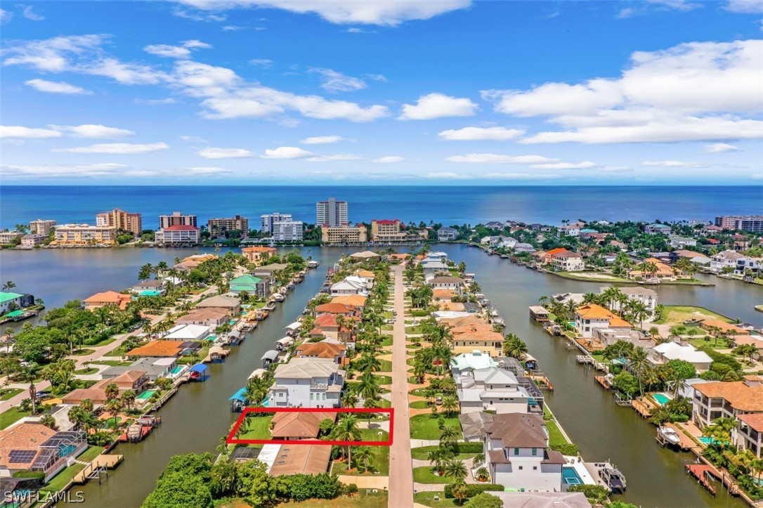 an aerial view of residential building and lake view