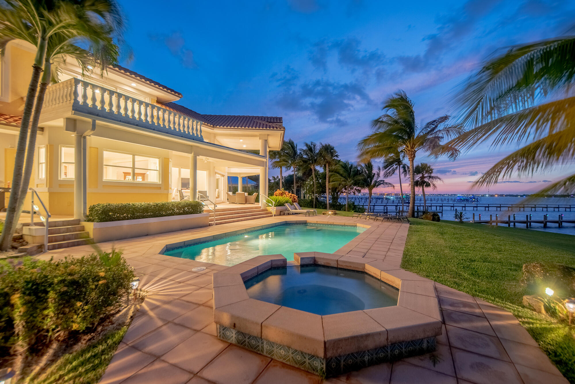 a view of a swimming pool with a patio