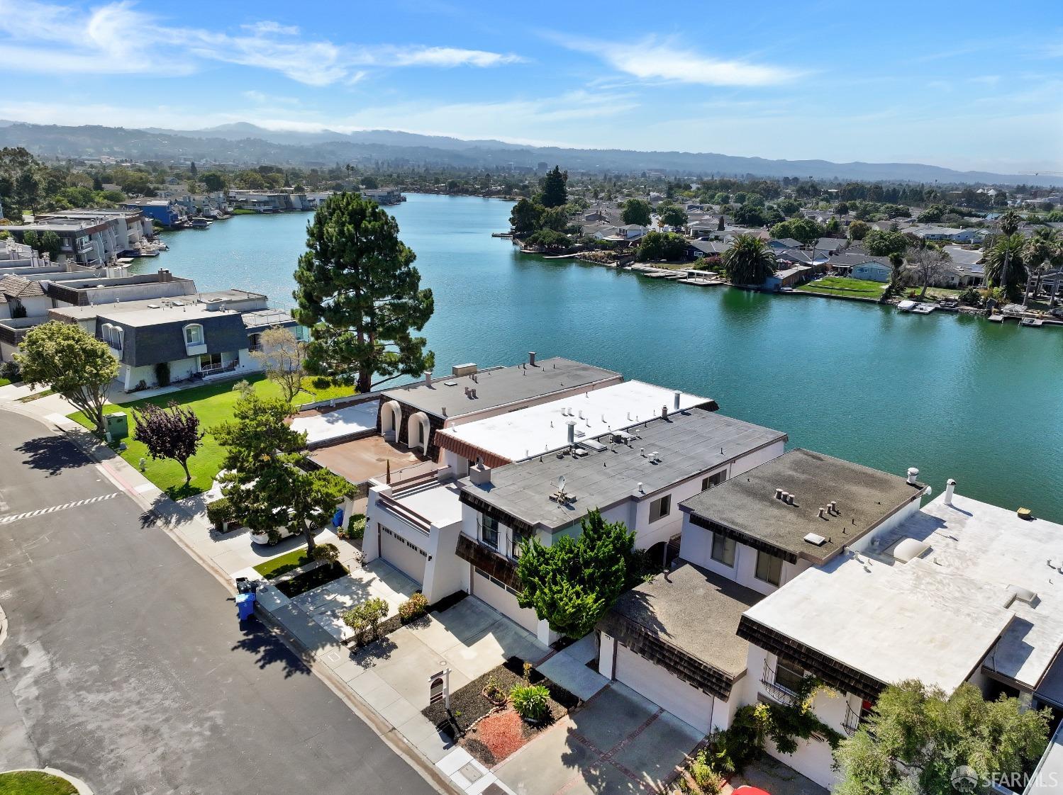 an aerial view of a house with outdoor space