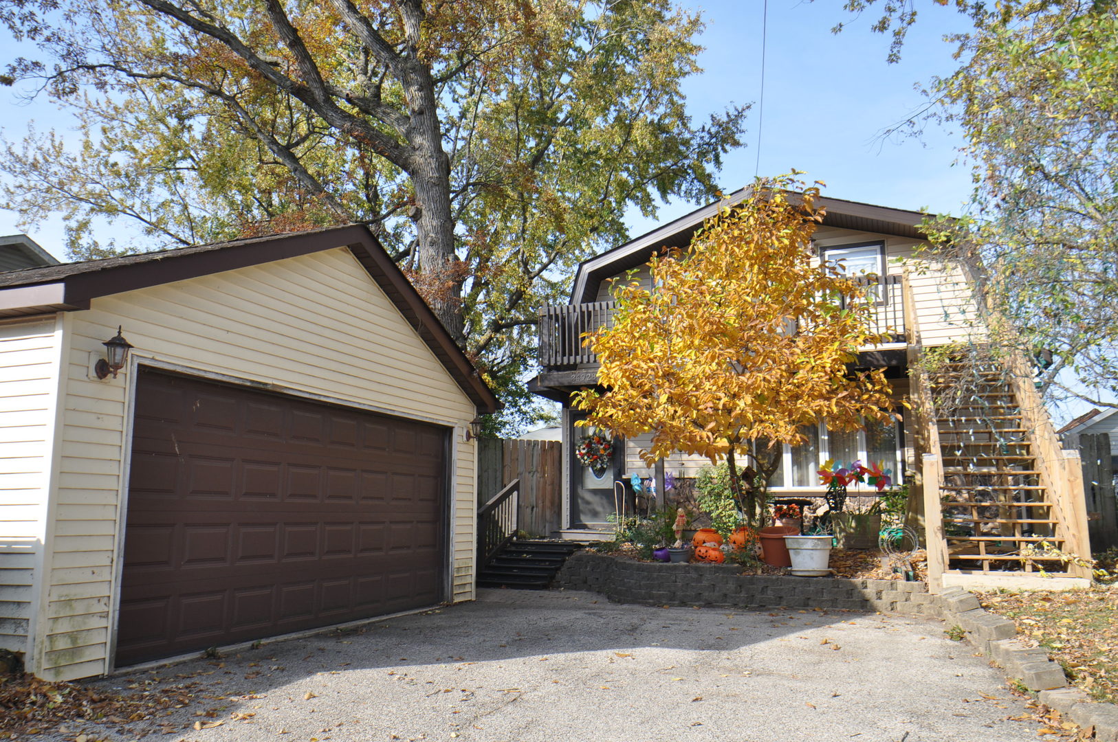 a view of a house with a tree