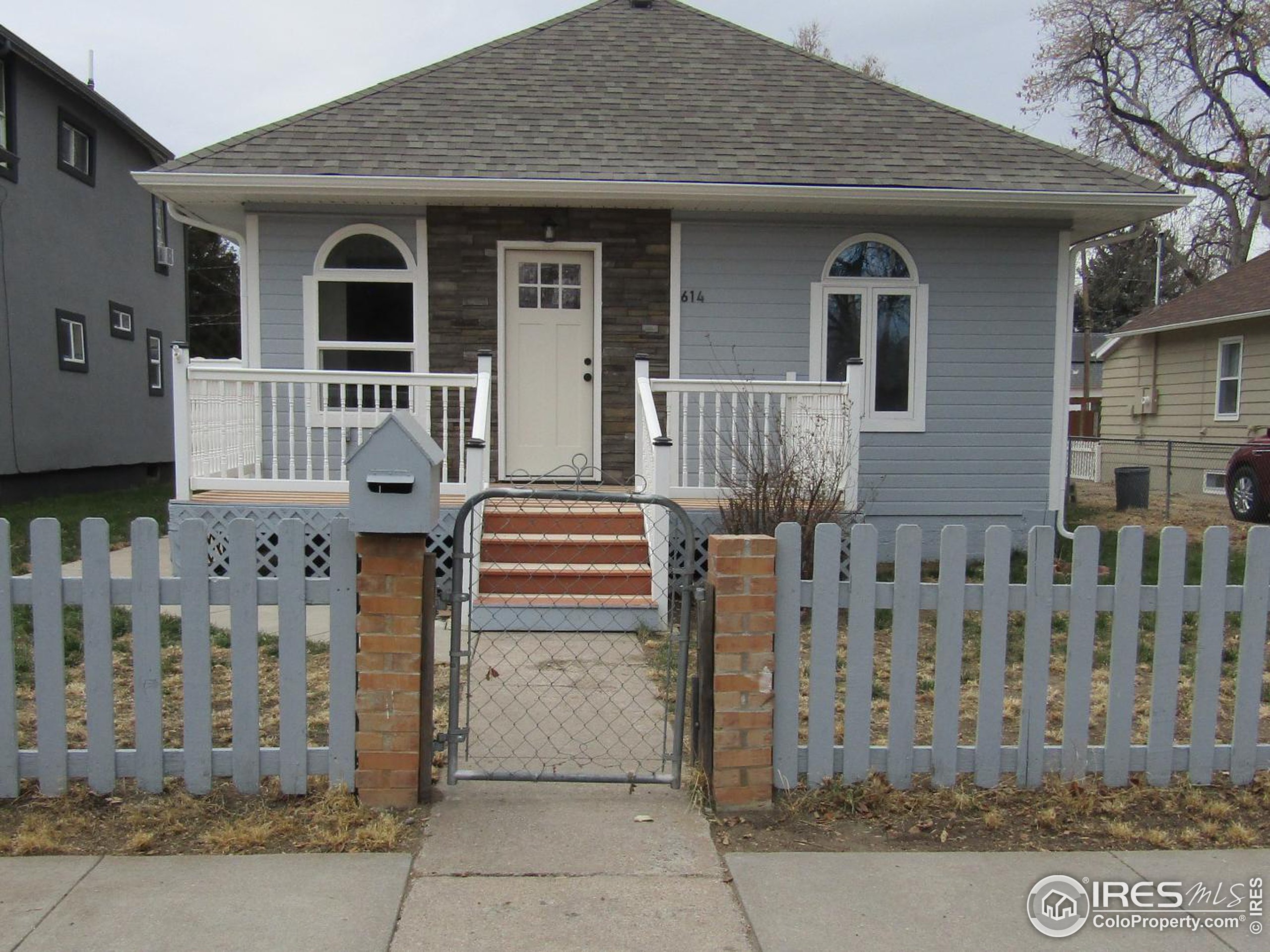 a front view of a house with windows