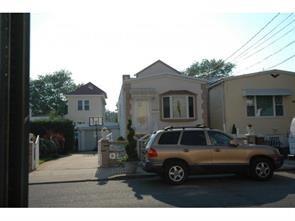 a car parked in front of a house