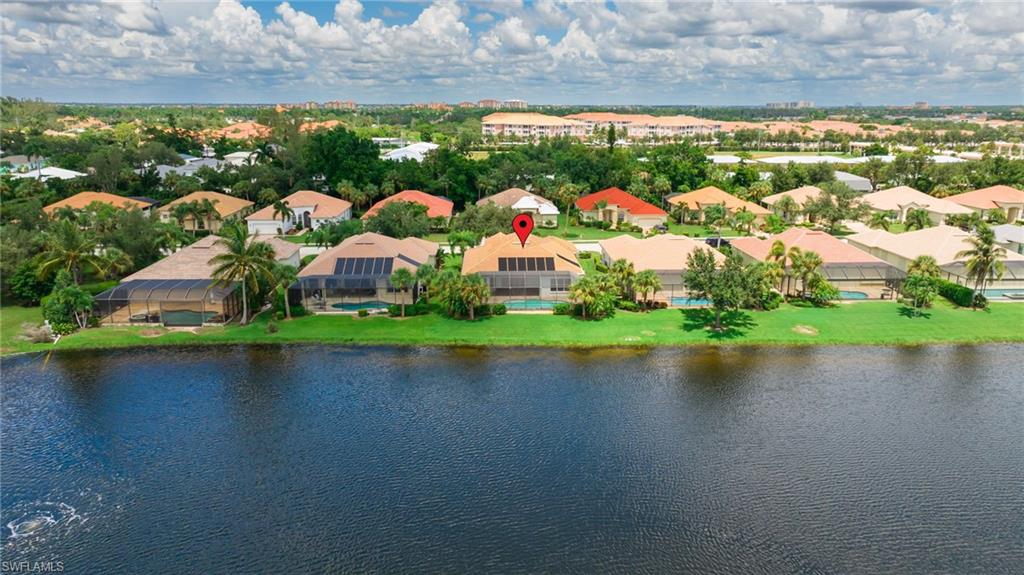 a view of a lake with houses