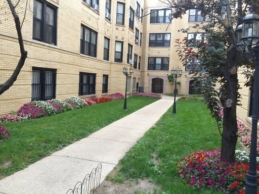 a view of a building with garden