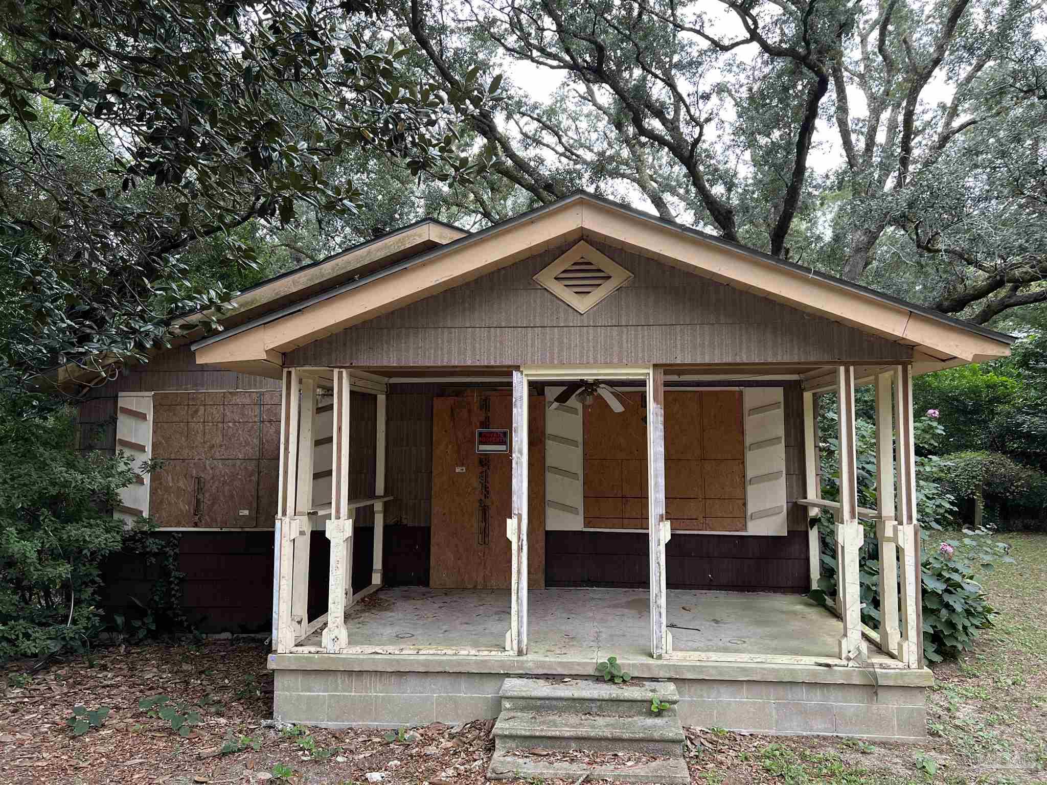 a front view of a house with porch