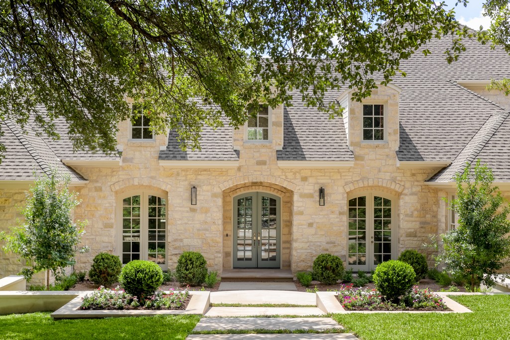 front view of a house with a yard