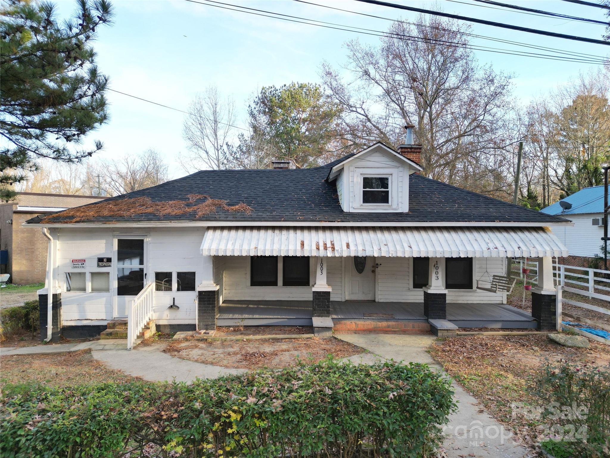 a front view of a house with garage