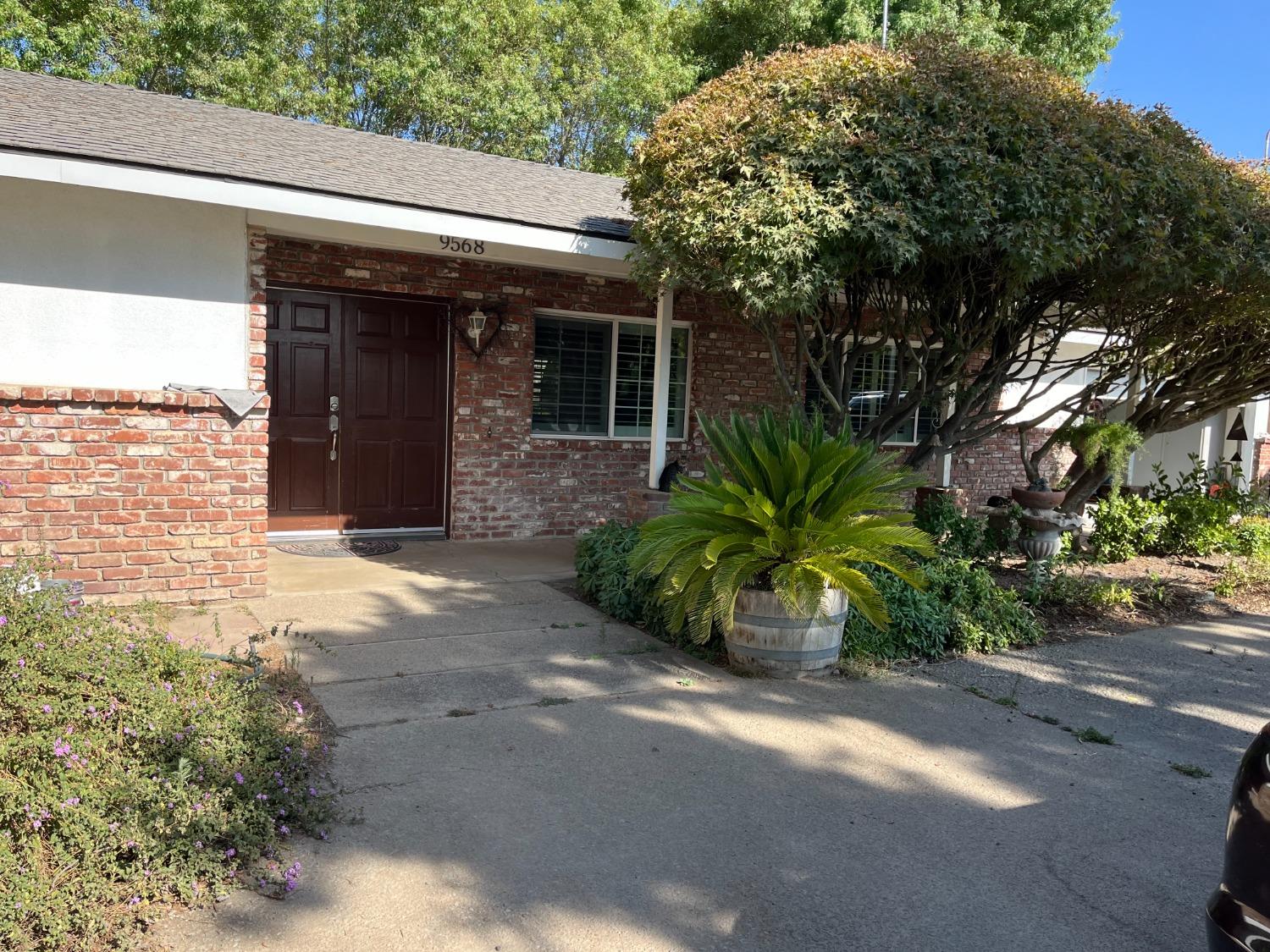 a view of a house with a street