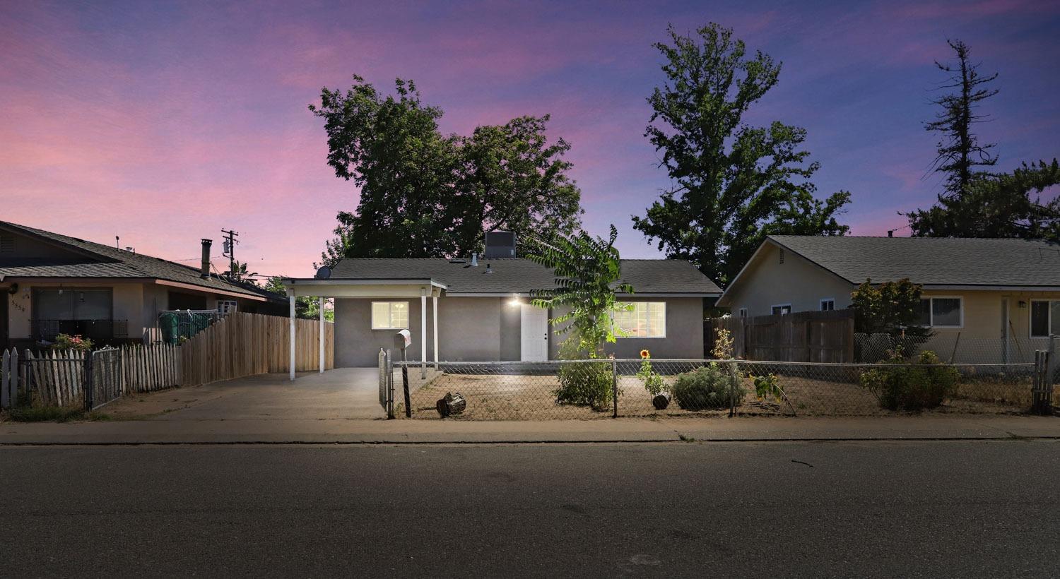 front view of a house with a street