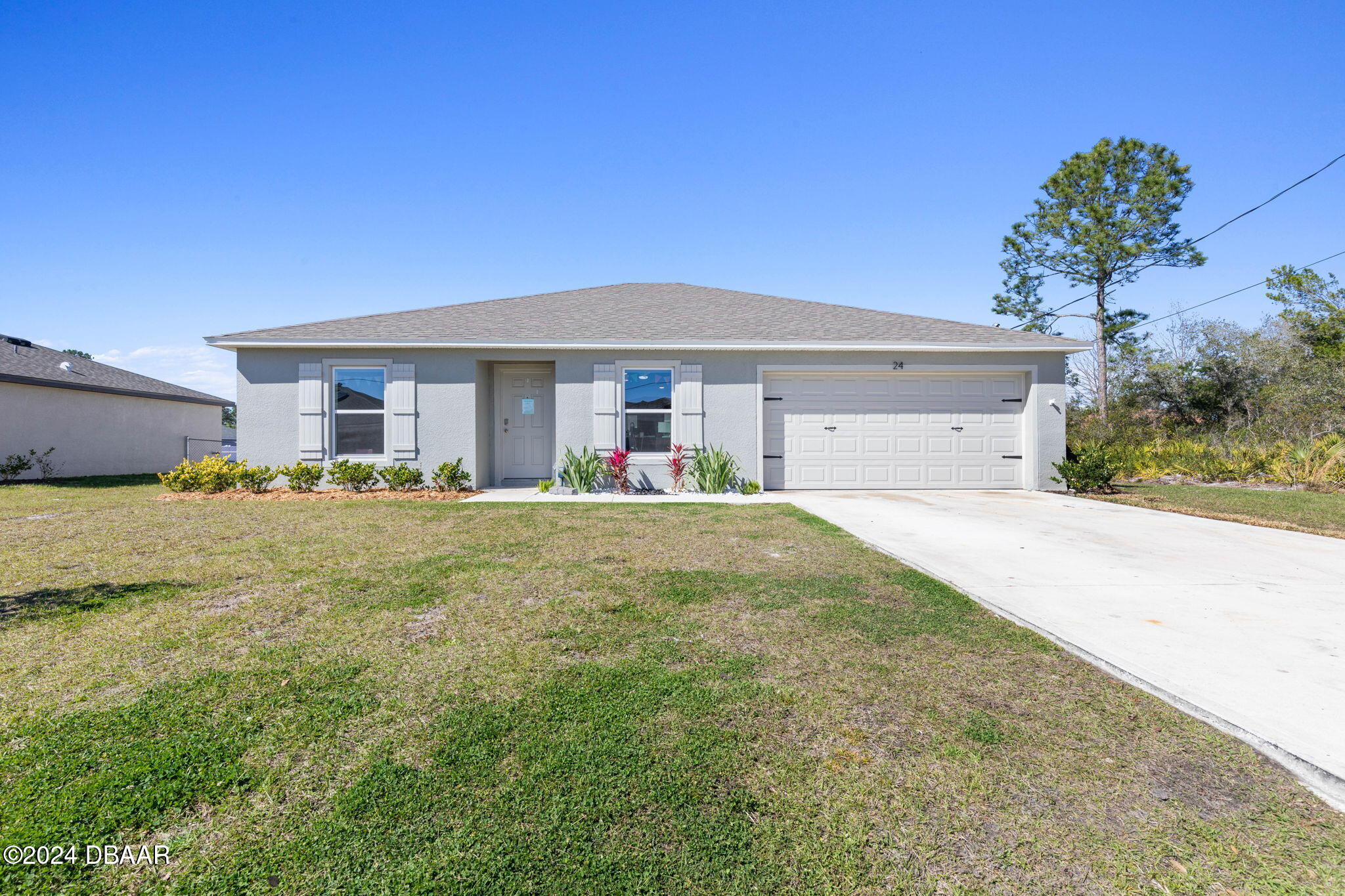 a front view of house with yard