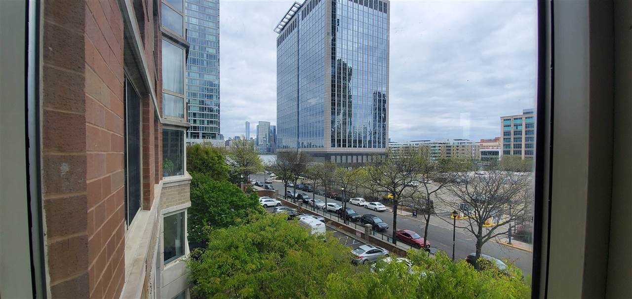 a view of a city with tall buildings