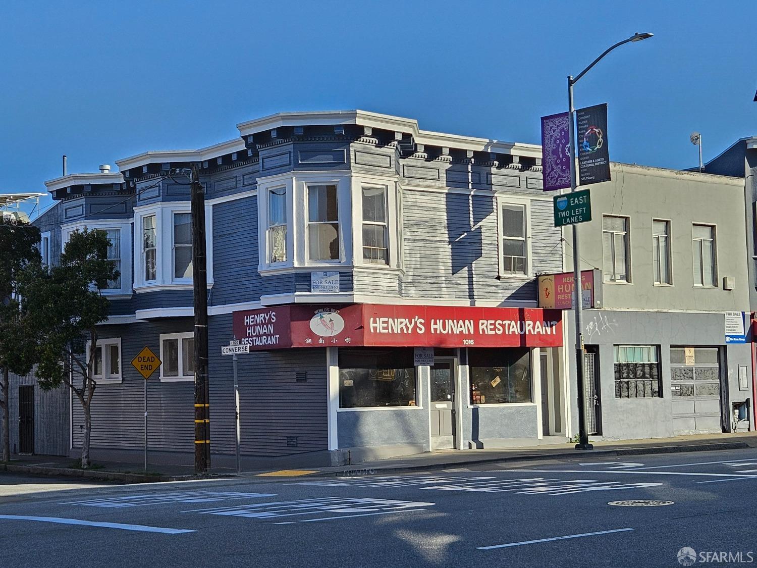 a view of a building with a street