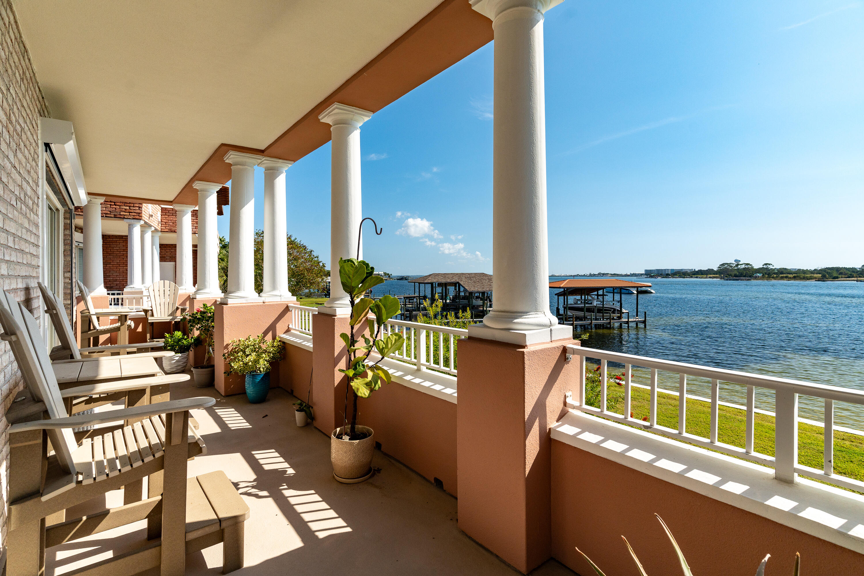 a view of a balcony with chairs