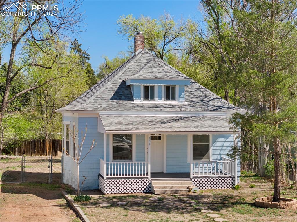 Bungalow-style home with a porch