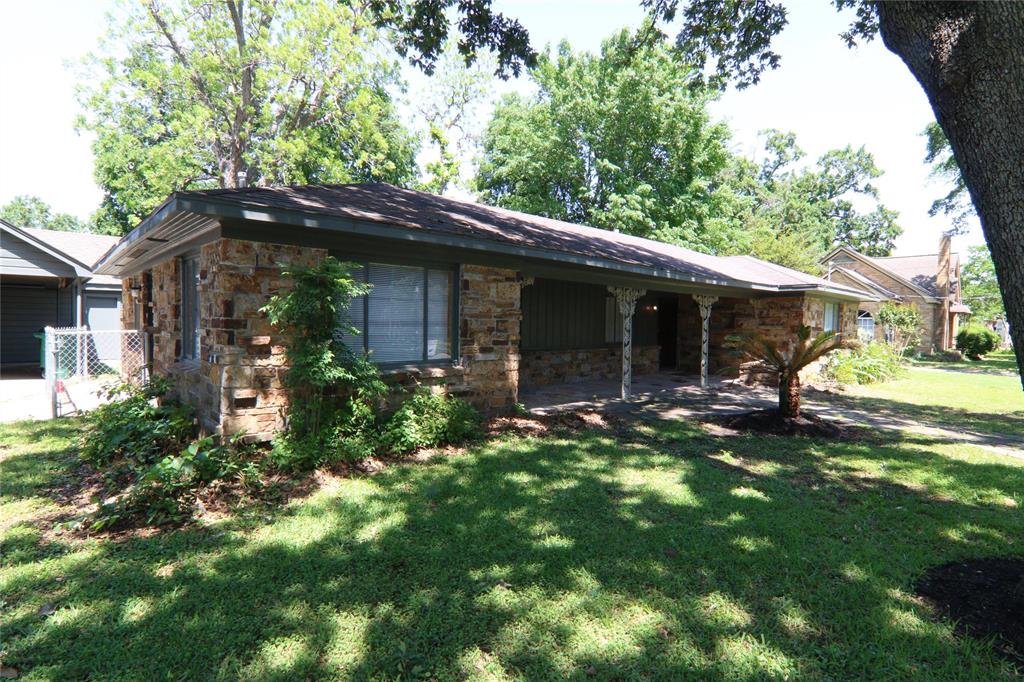 a view of a house with a garden