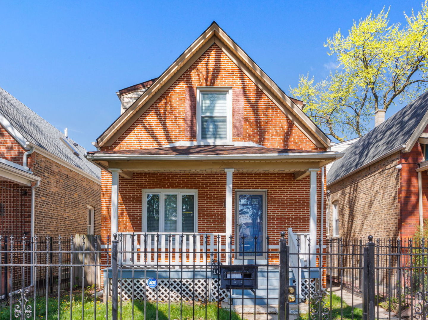 a front view of a house with a porch