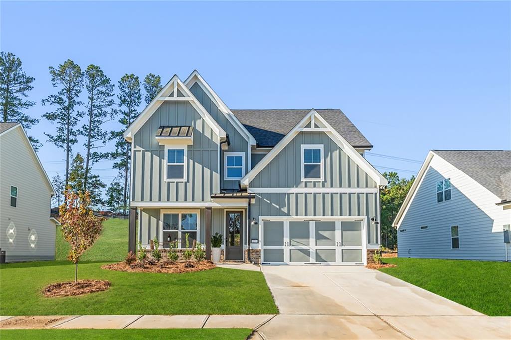 front view of a house with a yard