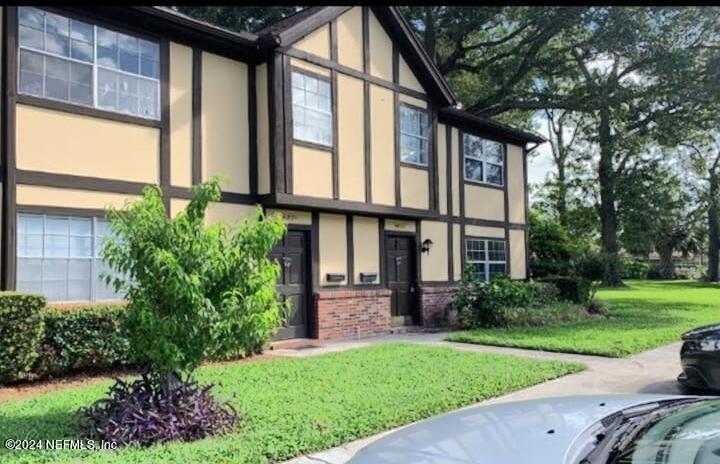 front view of house with a yard