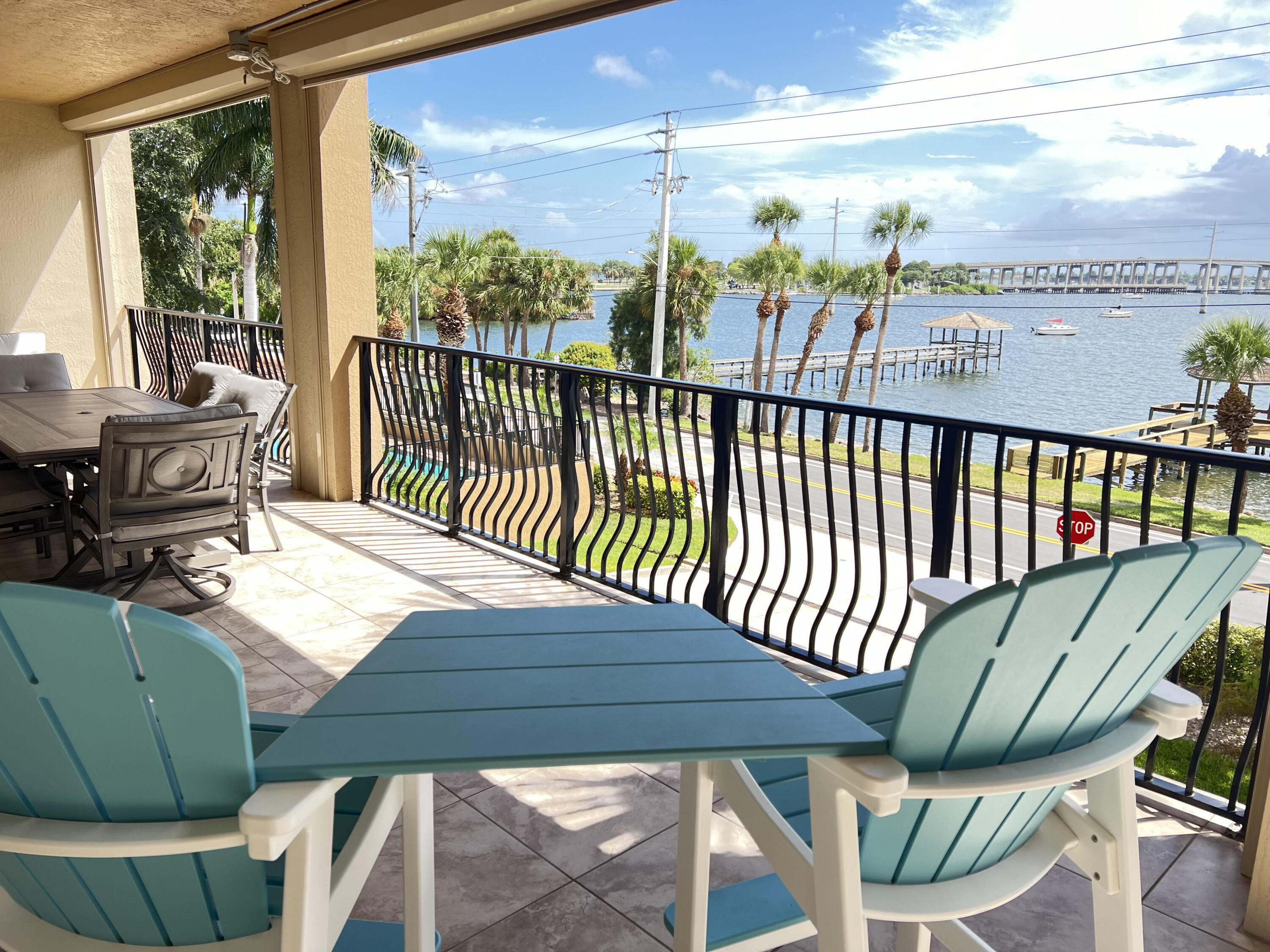 a view of a balcony with furniture