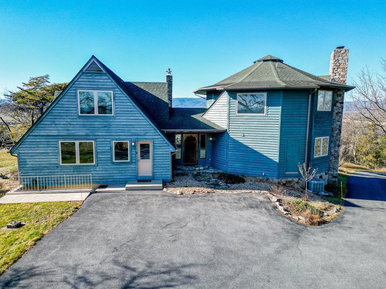 a front view of a house with yard