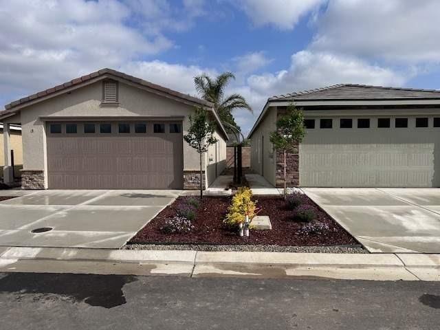 a front view of a house with entertaining space