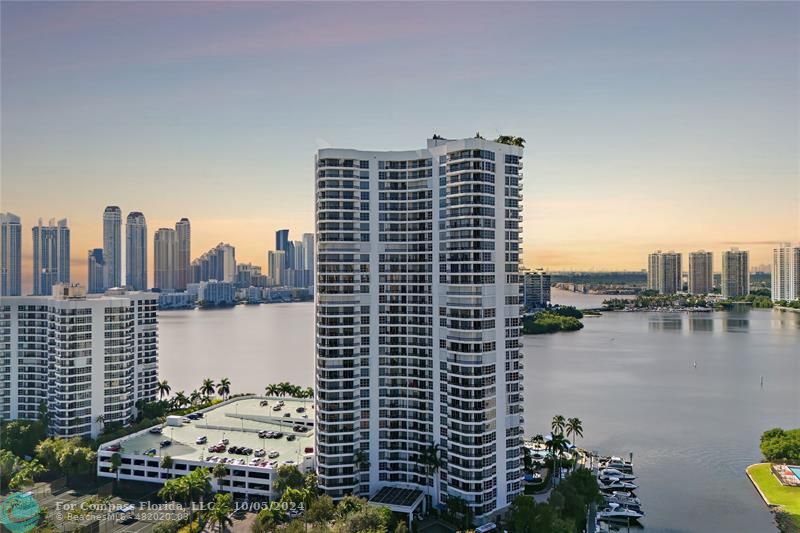 a view of a city with tall buildings