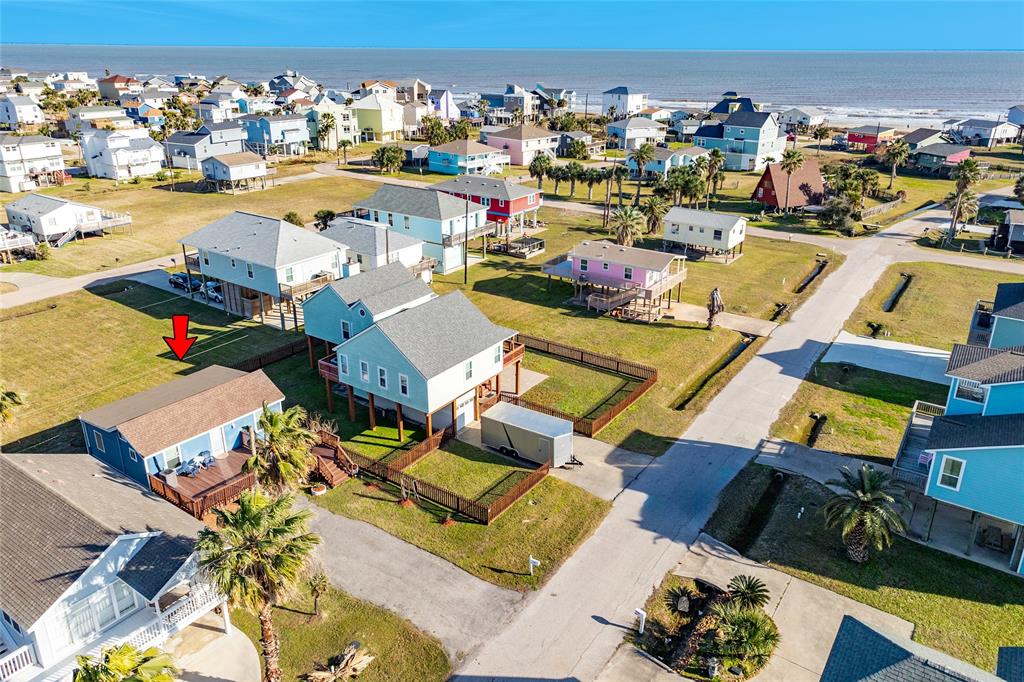 an aerial view of a houses with outdoor space