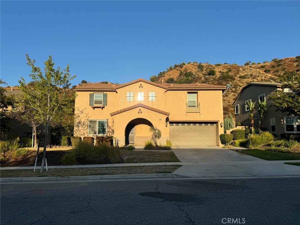 a house view with a outdoor space