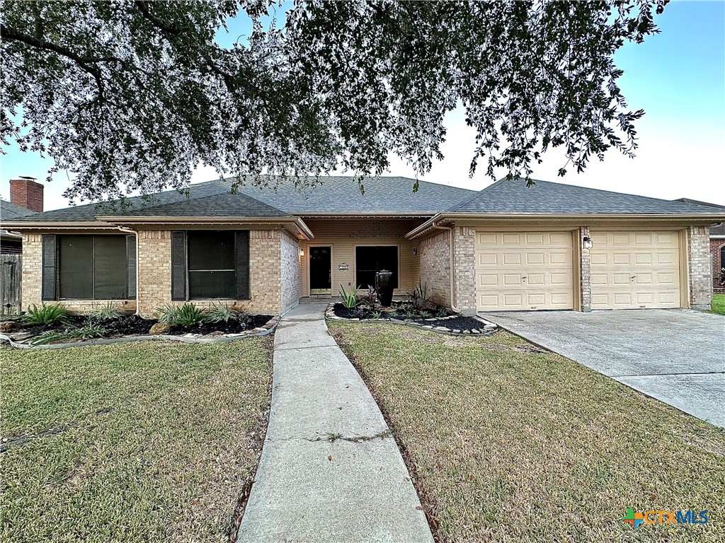 front view of a house with a patio