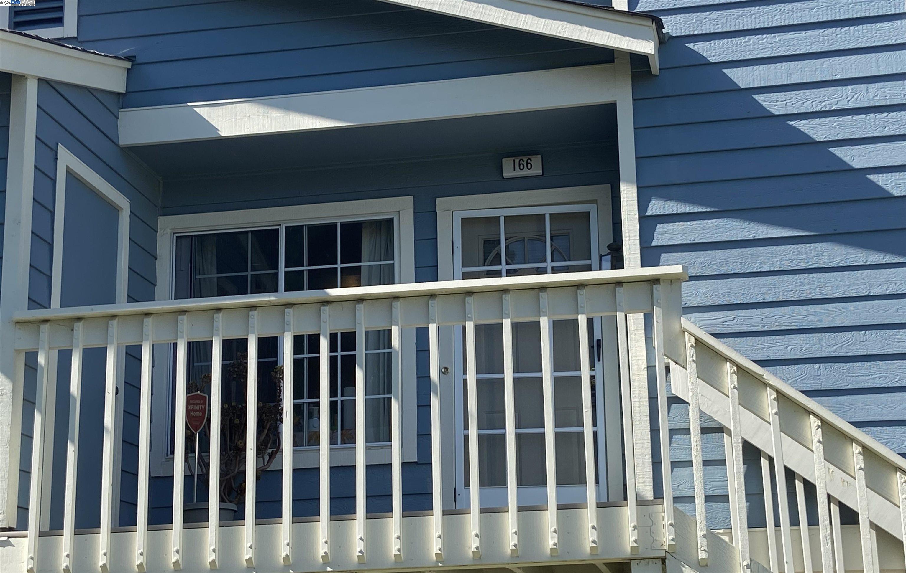 a view of wooden house with a window