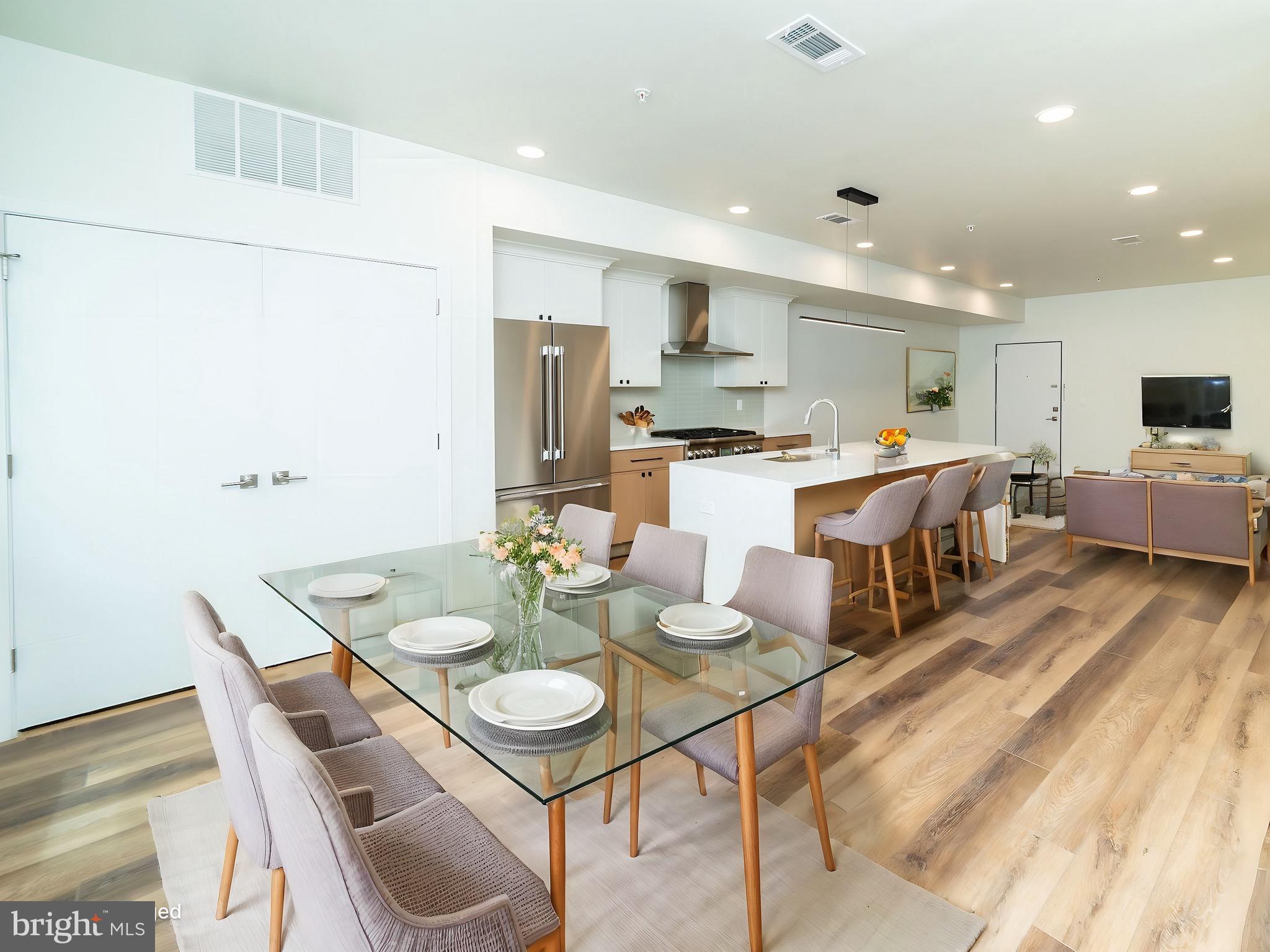 a view of a dining room with furniture