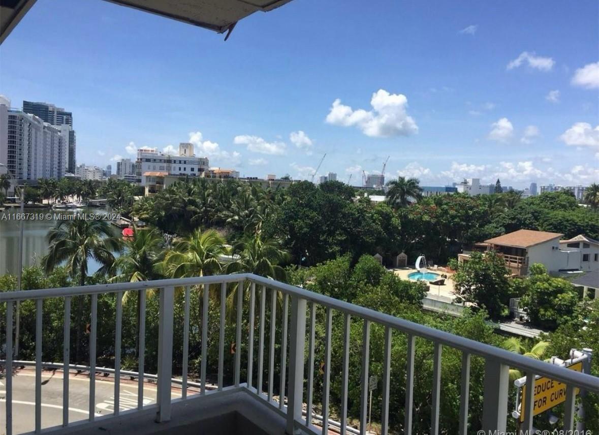 a view of a city from a balcony