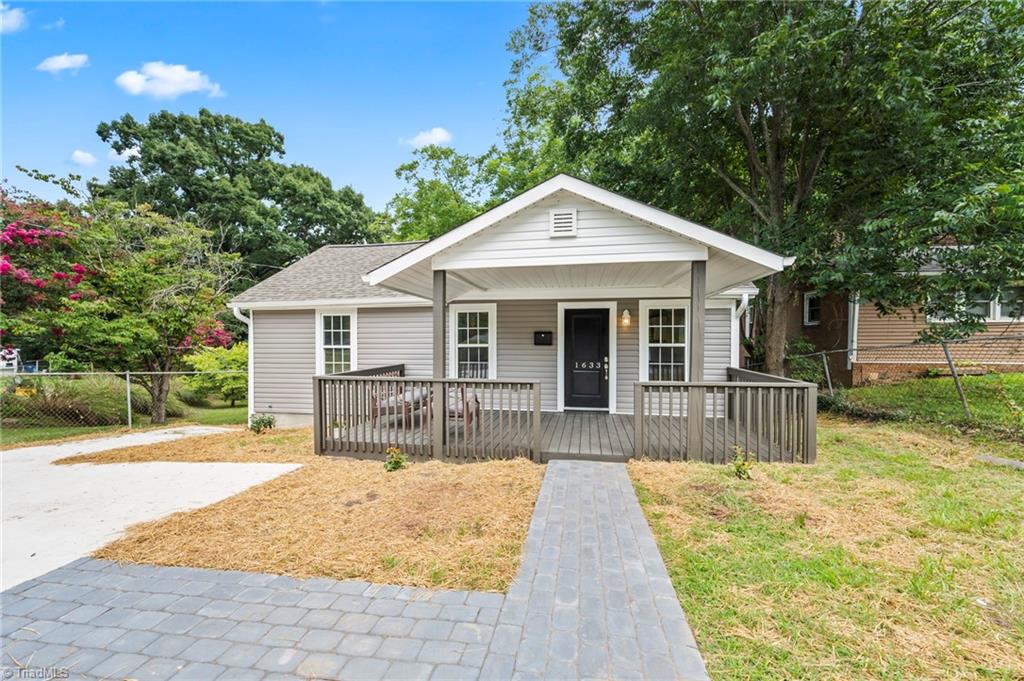 A classic Bungalow with double pavered walkways.