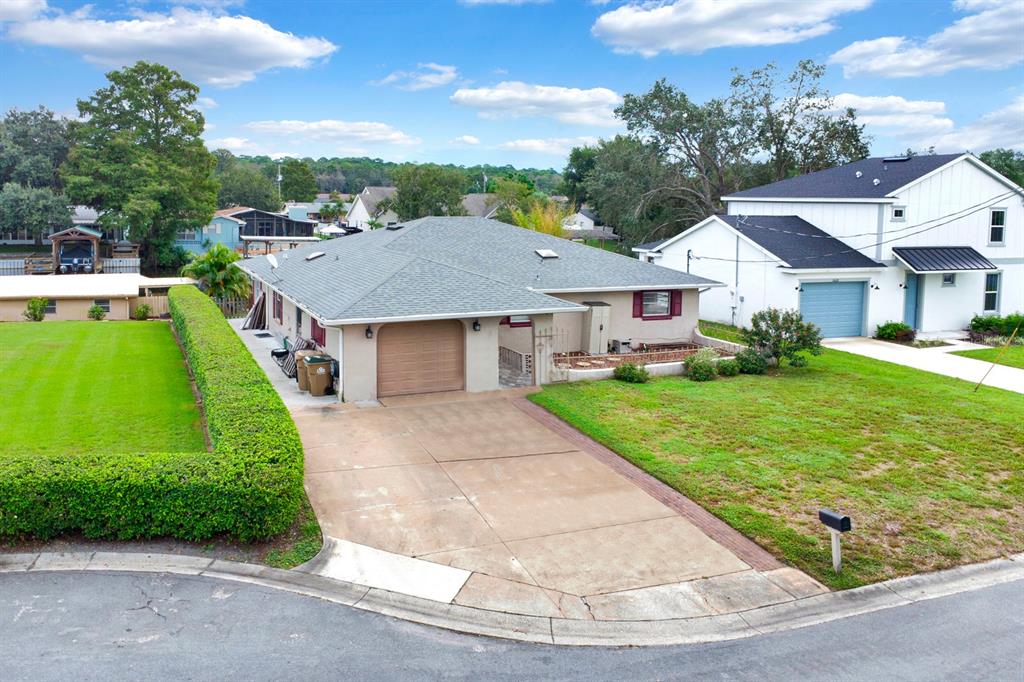 a aerial view of a house with garden