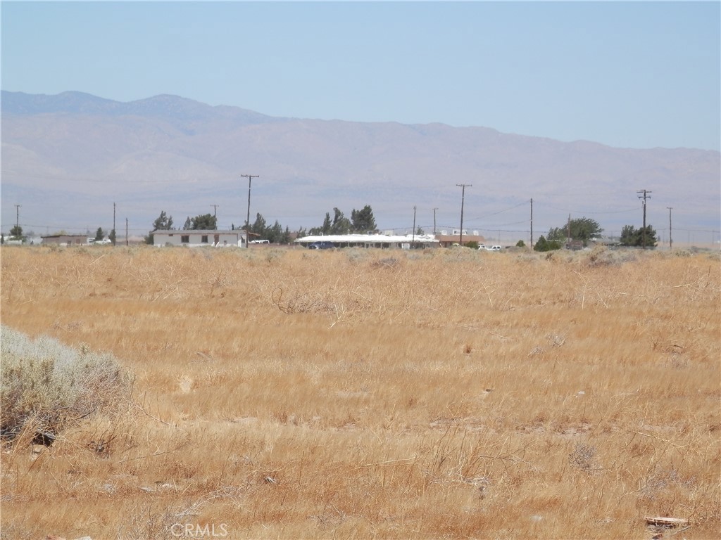 a view of ocean and mountains