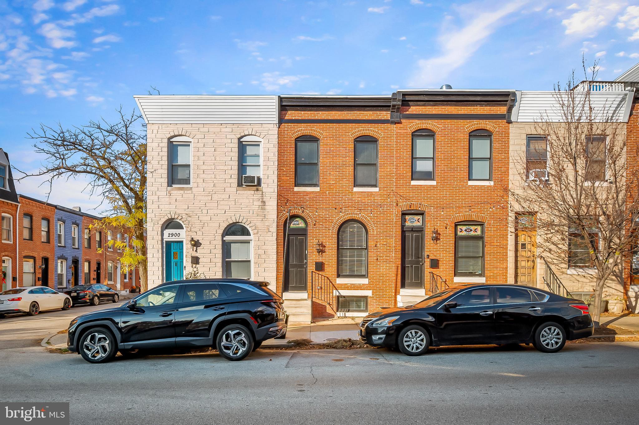 a car parked in front of a house