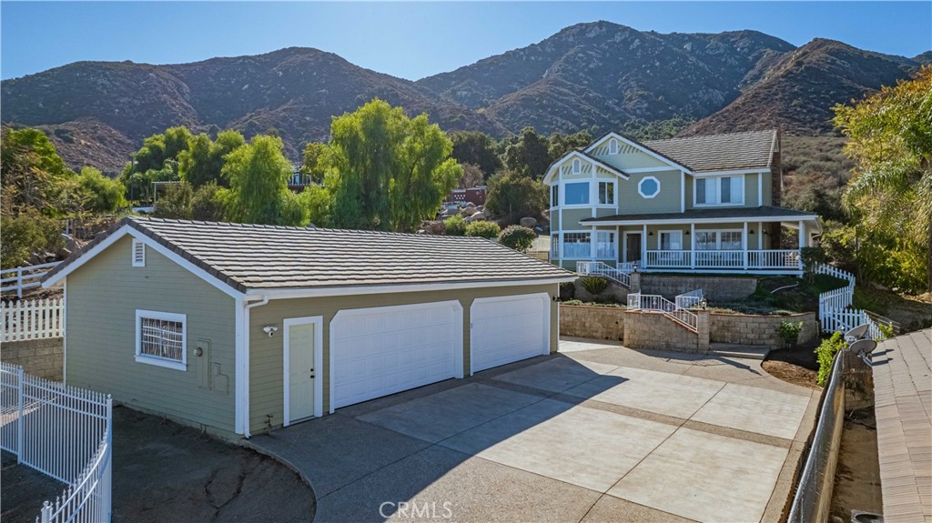 a aerial view of a house with a yard