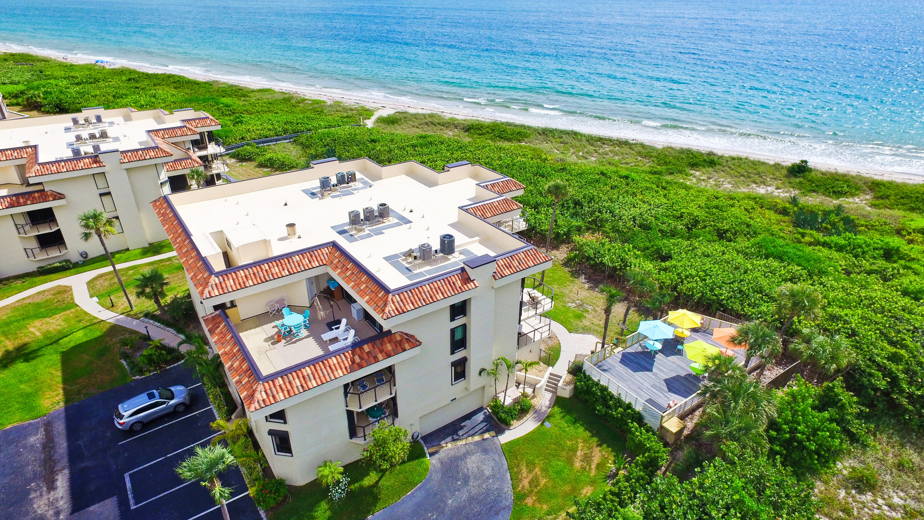 a aerial view of a house with a yard